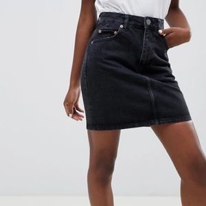 Black denim skirt